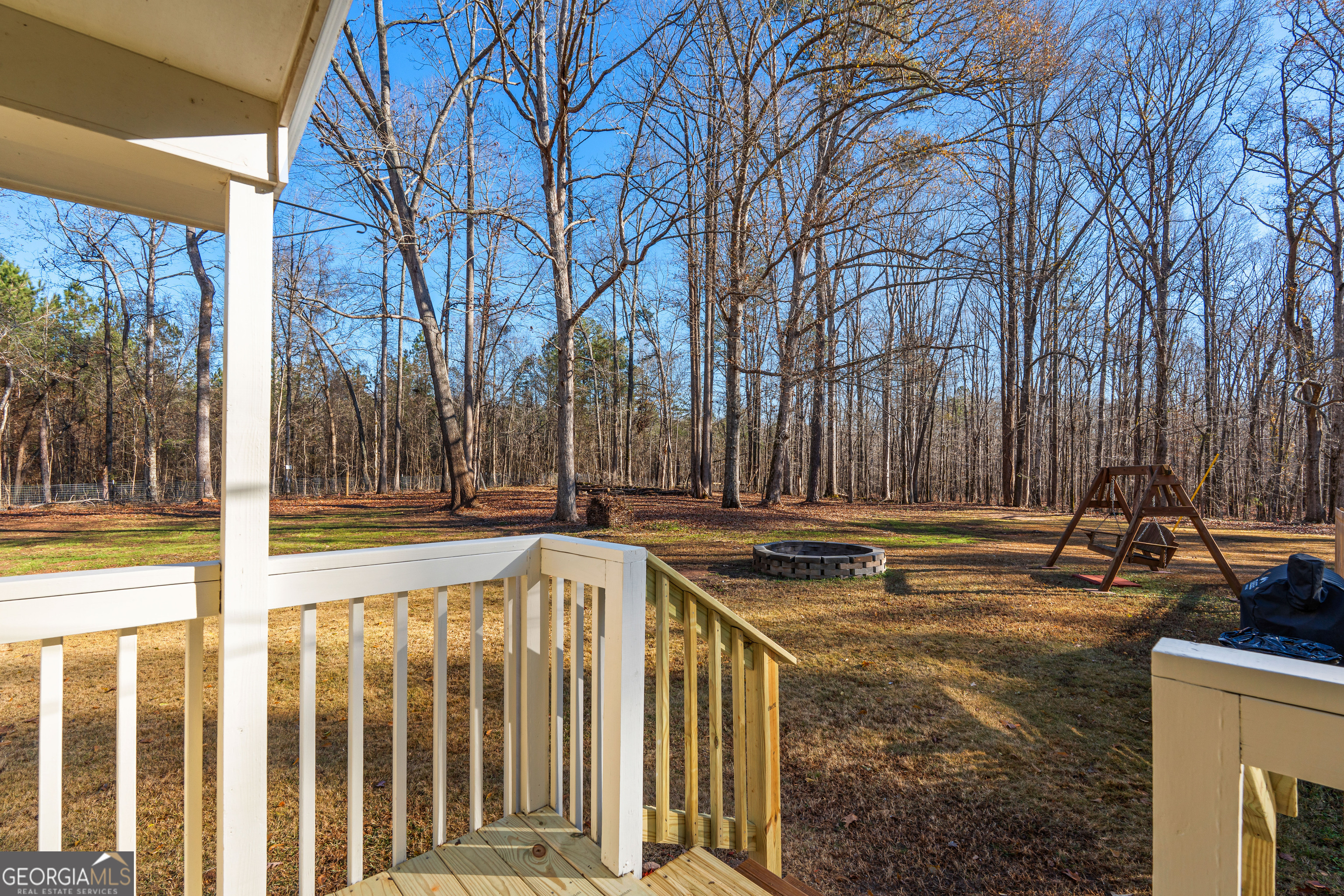 209 Boogers Hill Road Oxford, GA 30054 - Photo 34 of 44 a view of swimming pool with patio and yard