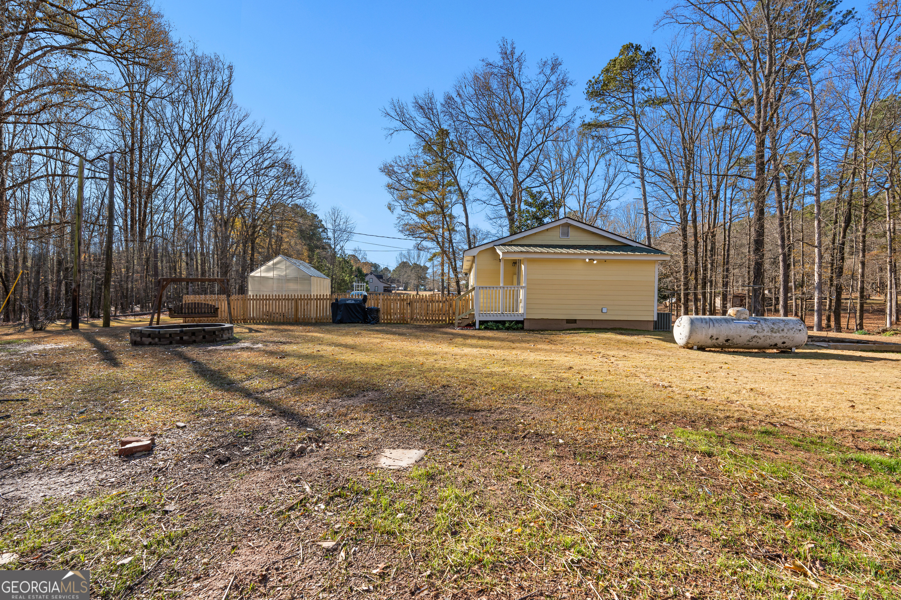 209 Boogers Hill Road Oxford, GA 30054 - Photo 38 of 44 a front view of a house with a yard