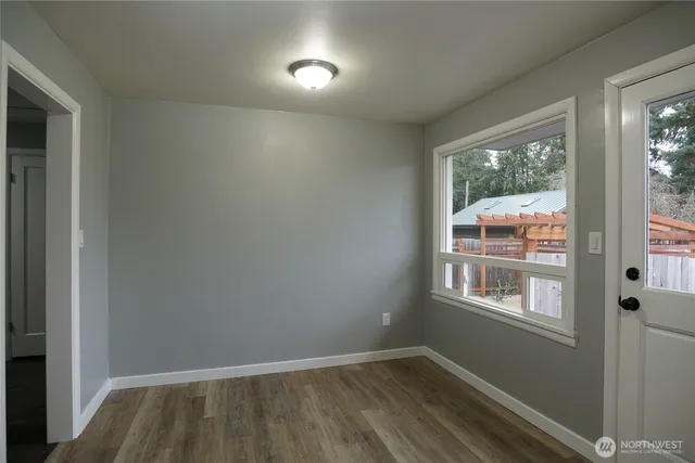 an empty room with windows