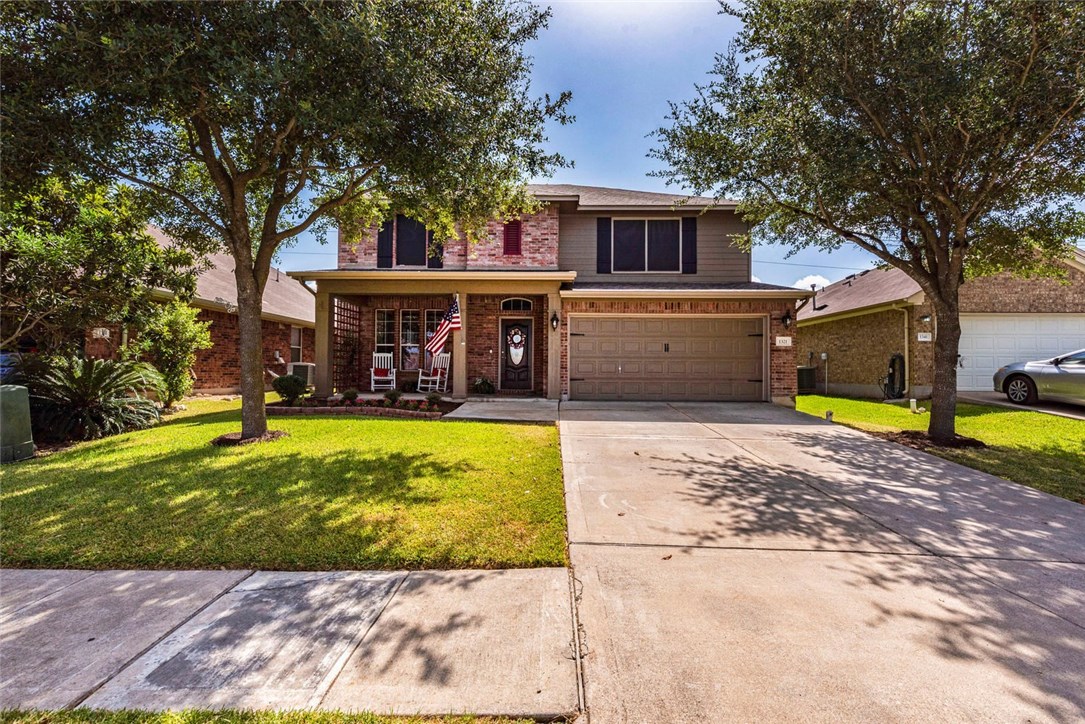 1321 Stone Rim Loop Buda, TX 78610 - Photo 1 of 1 a view of a house with swimming pool and a yard