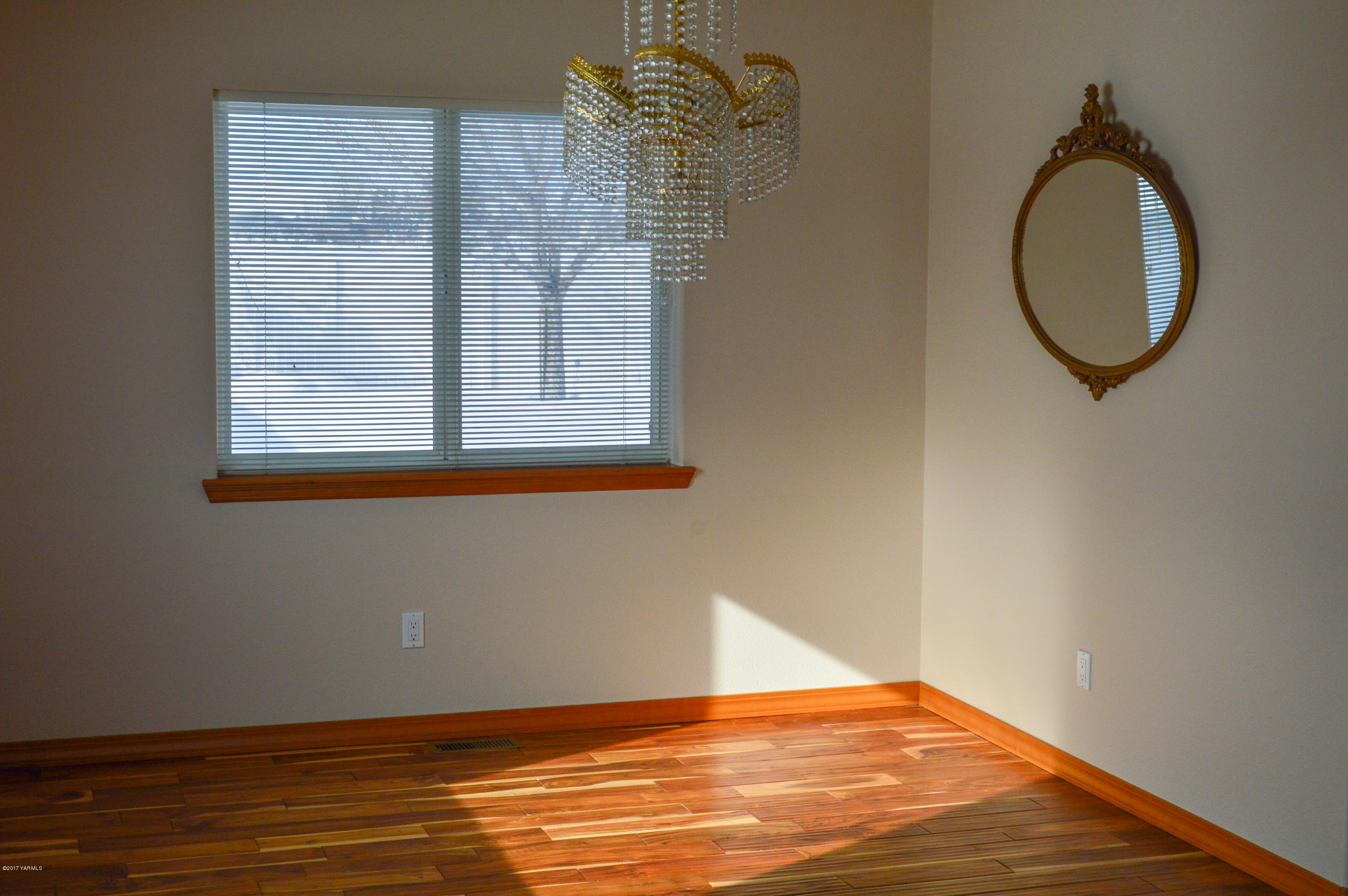 80 American Fruit Road Yakima, WA 98903 - Photo 8 of 30 a view of a room with wooden floor and a window