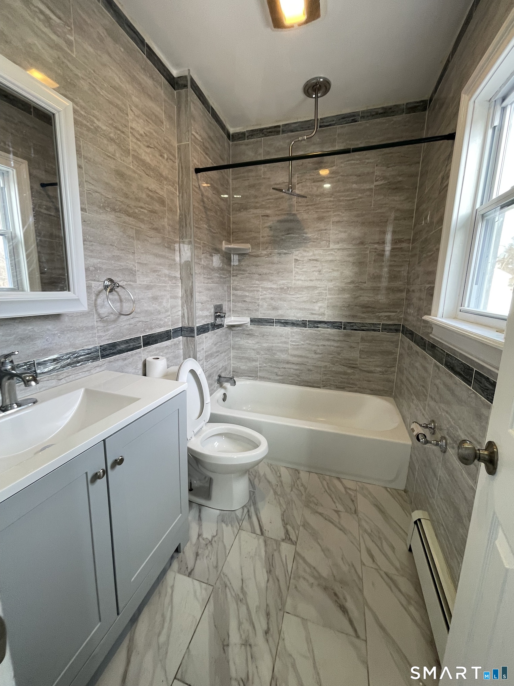 176 Pearl Street Waterbury, CT 06704 - Photo 13 of 19 a bathroom with a sink toilet and shower