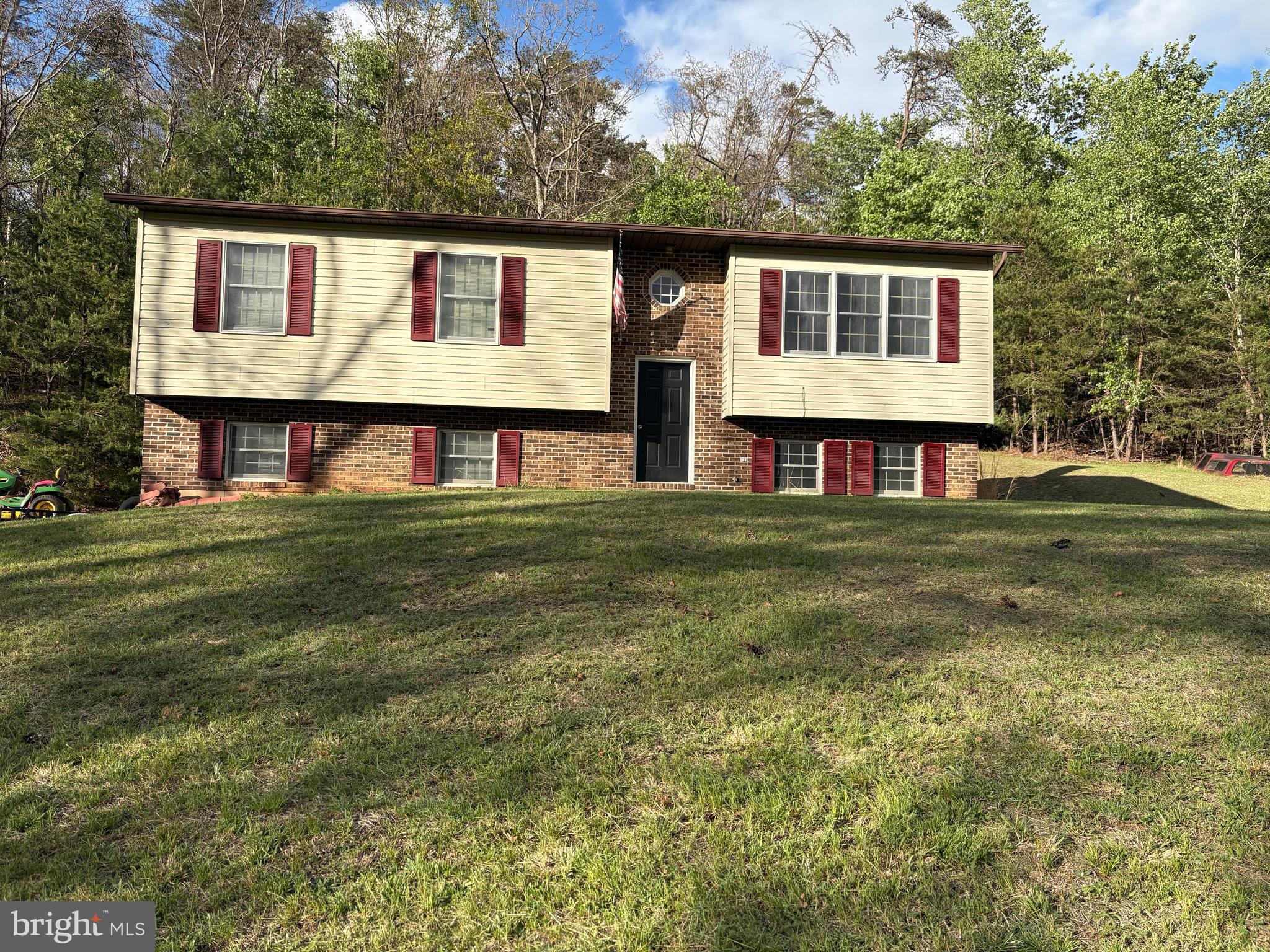 2865 Capon Springs Road High View, WV 26808 - Photo 23 of 34 a front view of a house with a garden