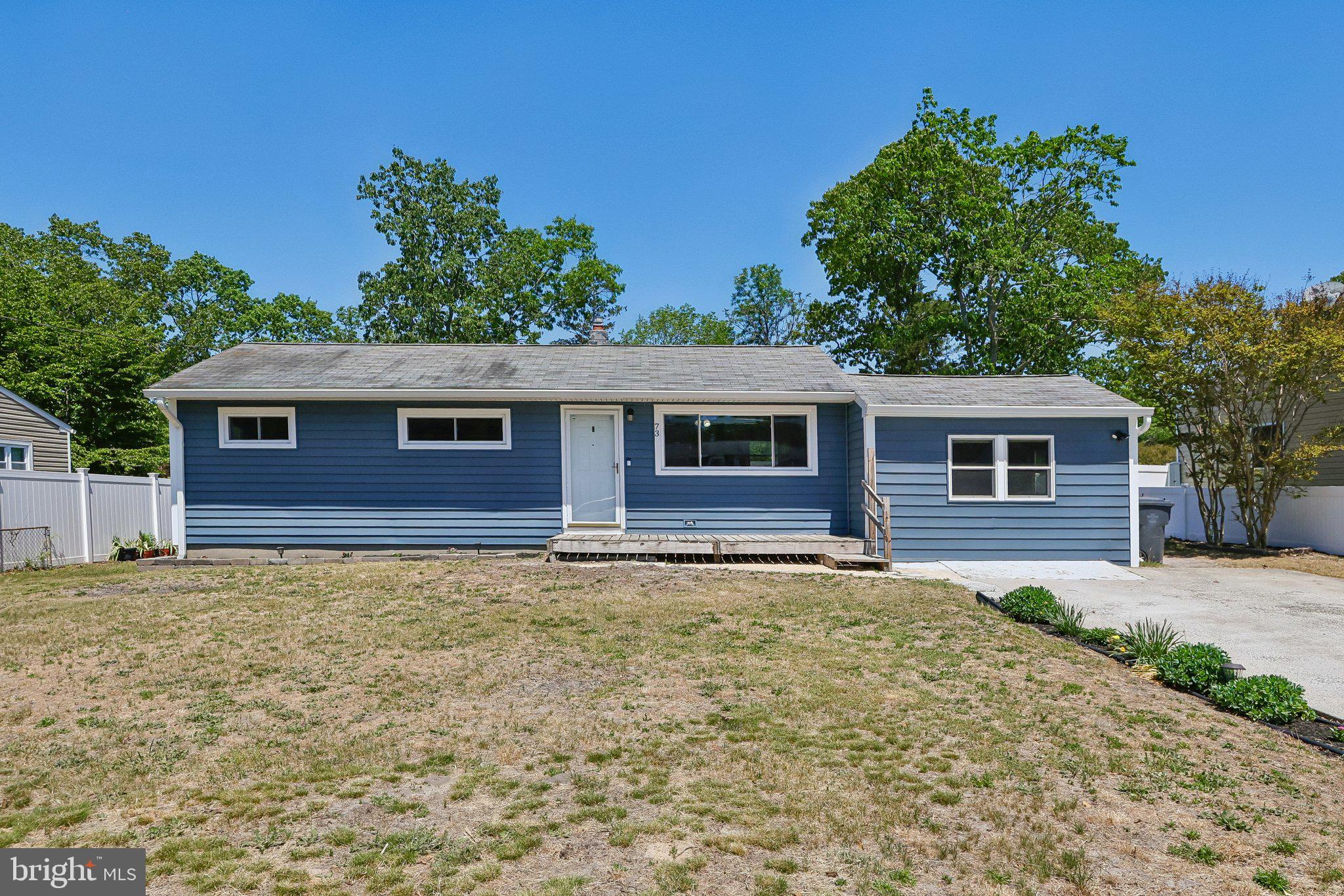 73 Burnt Tavern Road Brick, NJ 08724 - Photo 2 of 31 a front view of a house with garden