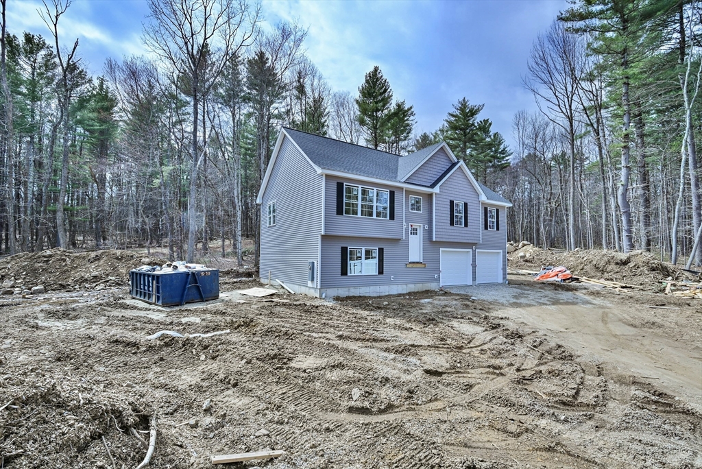 86 Ramshorn Road Dudley, MA 01571 - Photo 4 of 33 a view of a house with a yard