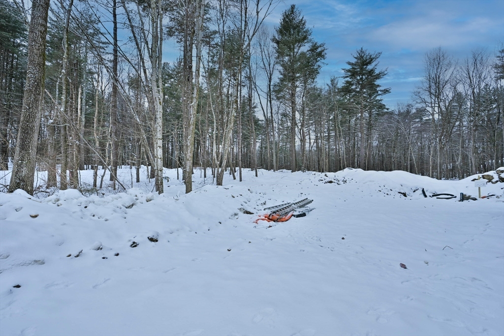 86 Ramshorn Road Dudley, MA 01571 - Photo 7 of 33 a view of a snow with snow on the road
