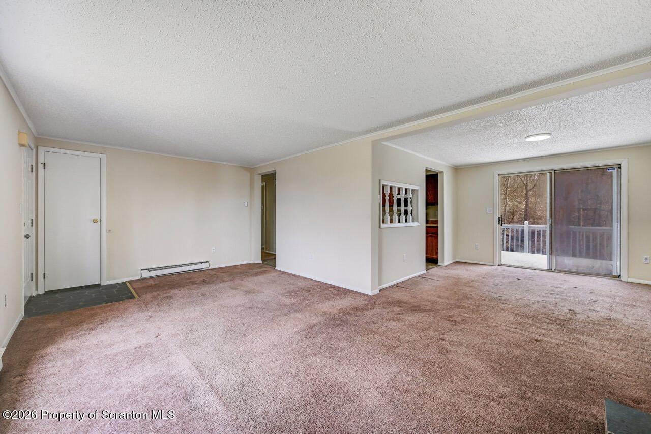 3032 1/2 Division Street Scranton, PA 18504 - Photo 12 of 49 a view of an empty room with a window