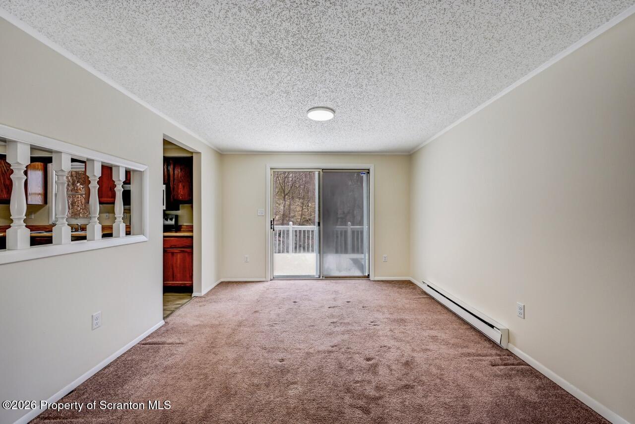 3032 1/2 Division Street Scranton, PA 18504 - Photo 13 of 49 a view of an empty room with window and closet