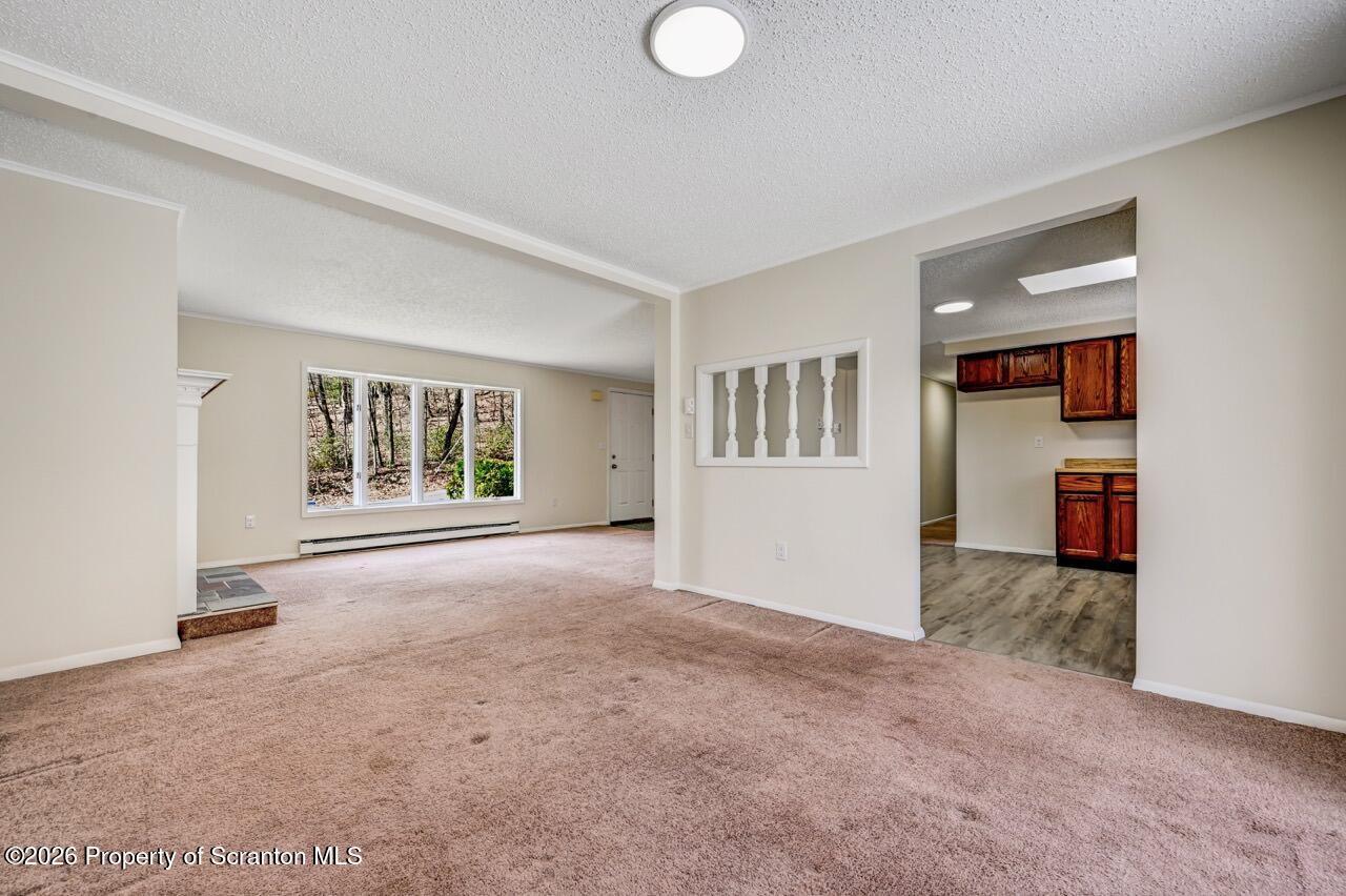 3032 1/2 Division Street Scranton, PA 18504 - Photo 15 of 49 an empty room with windows