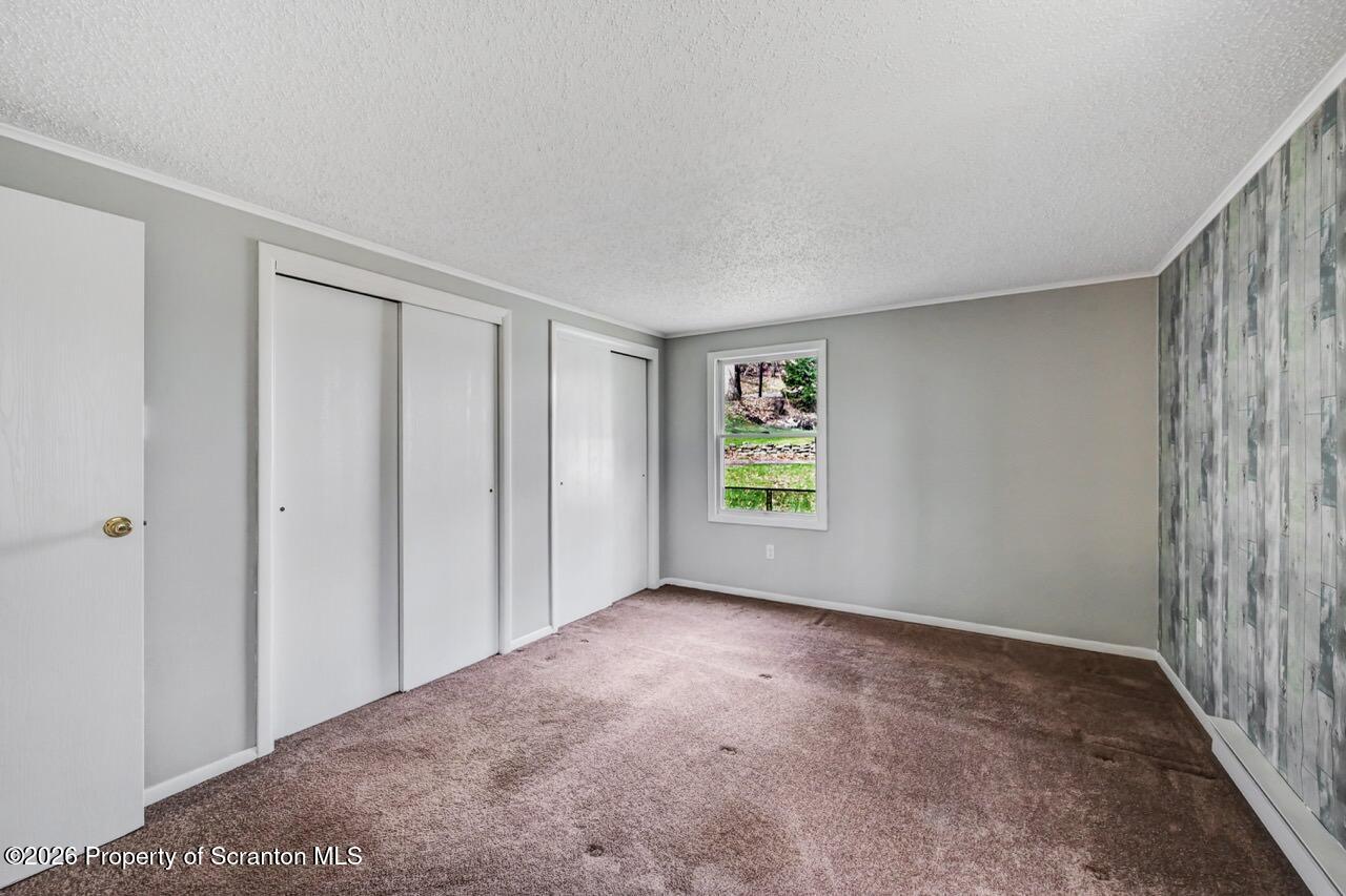 3032 1/2 Division Street Scranton, PA 18504 - Photo 26 of 49 a view of an empty room with a window