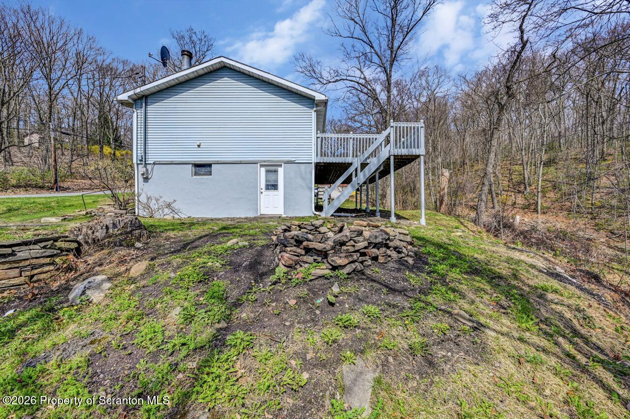 3032 1/2 Division Street Scranton, PA 18504 - Photo 46 of 49 a view of a house with a yard