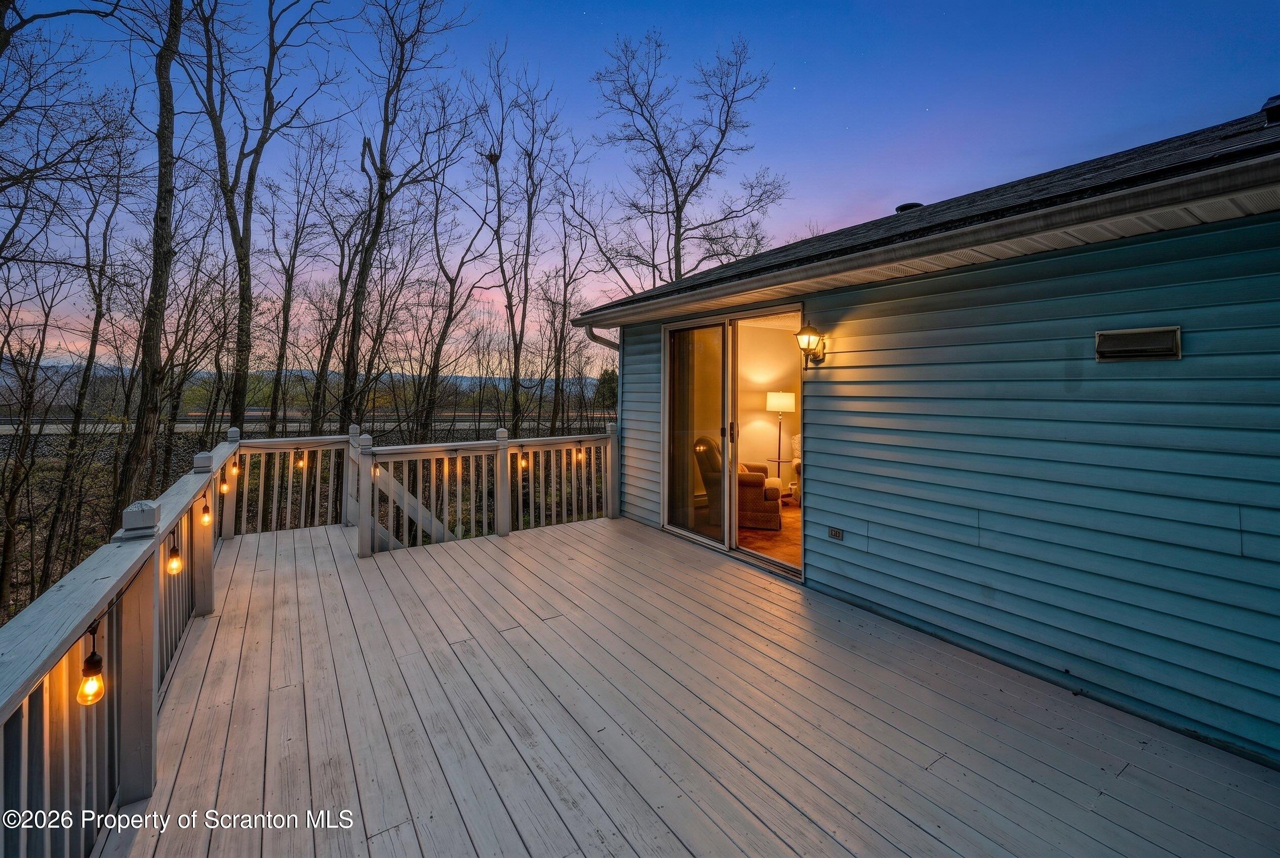 3032 1/2 Division Street Scranton, PA 18504 - Photo 6 of 49 a view of backyard with a deck and wooden floor