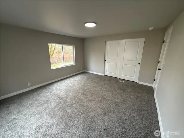 a view of a wooden deck with a bench