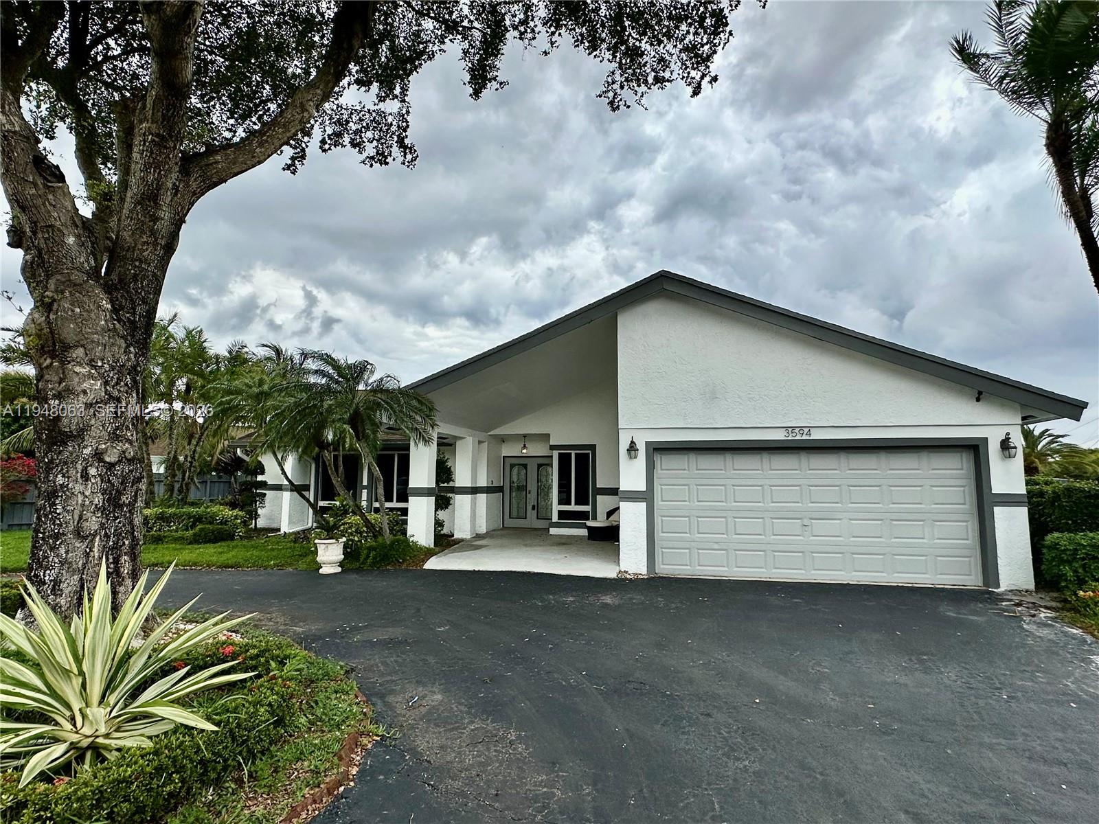 3594 Southwest 69th Avenue Miramar, FL 33023 - Photo 19 of 20 a view of backyard of the house