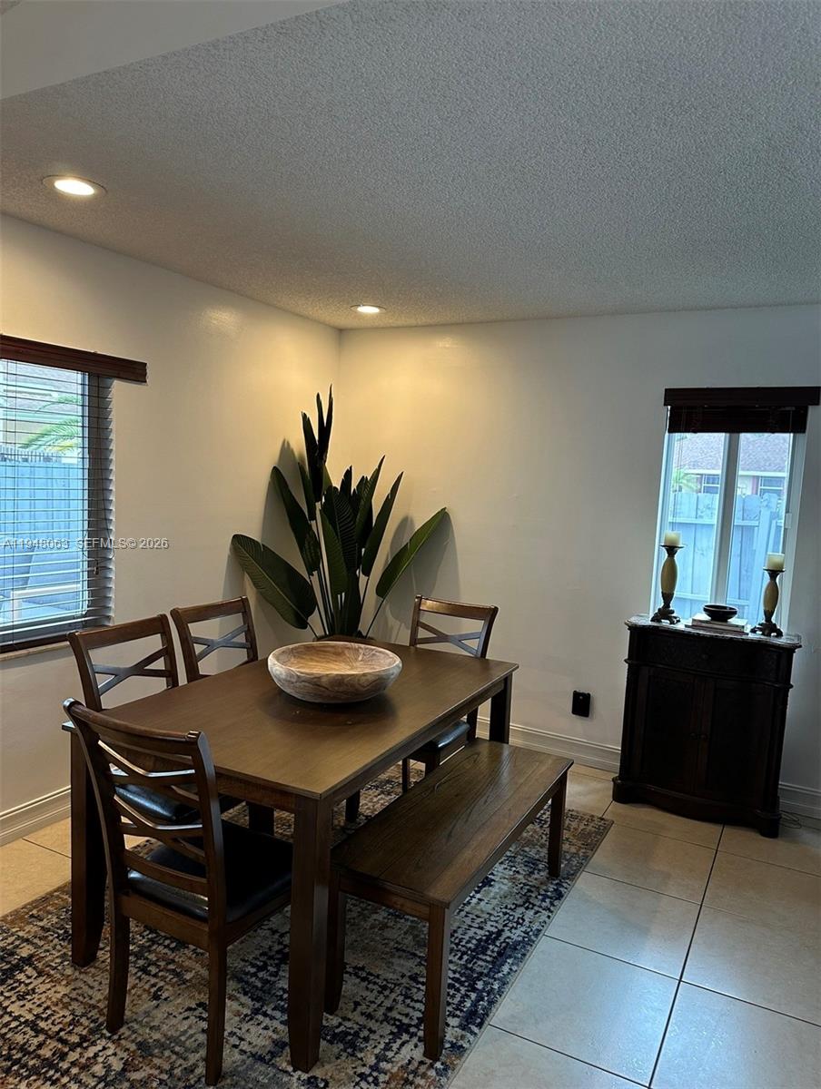 3594 Southwest 69th Avenue Miramar, FL 33023 - Photo 2 of 20 a view of a dining room with furniture and window