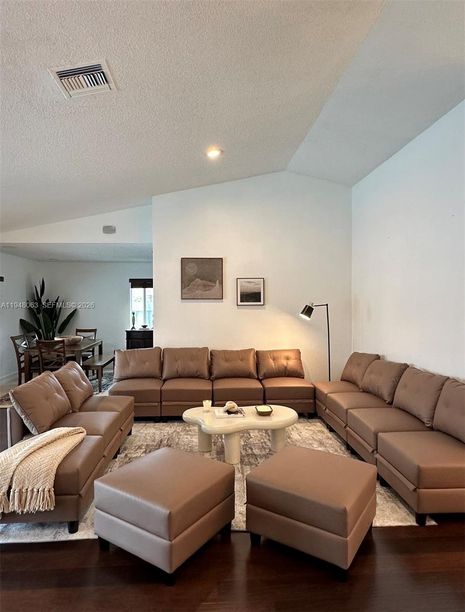 3594 Southwest 69th Avenue Miramar, FL 33023 - Photo 5 of 20 a living room with furniture and a couch