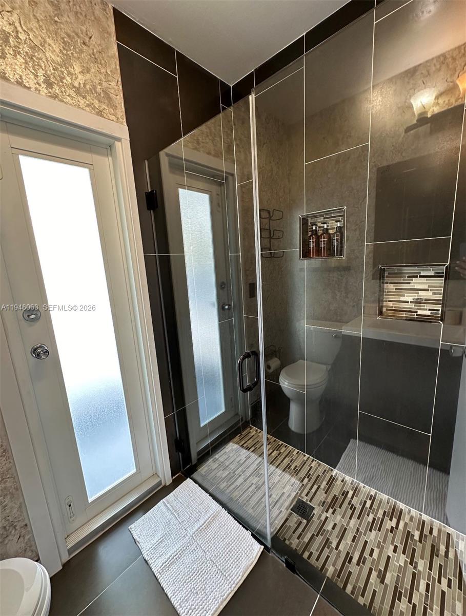 3594 Southwest 69th Avenue Miramar, FL 33023 - Photo 7 of 20 a bathroom with a sink and toilet