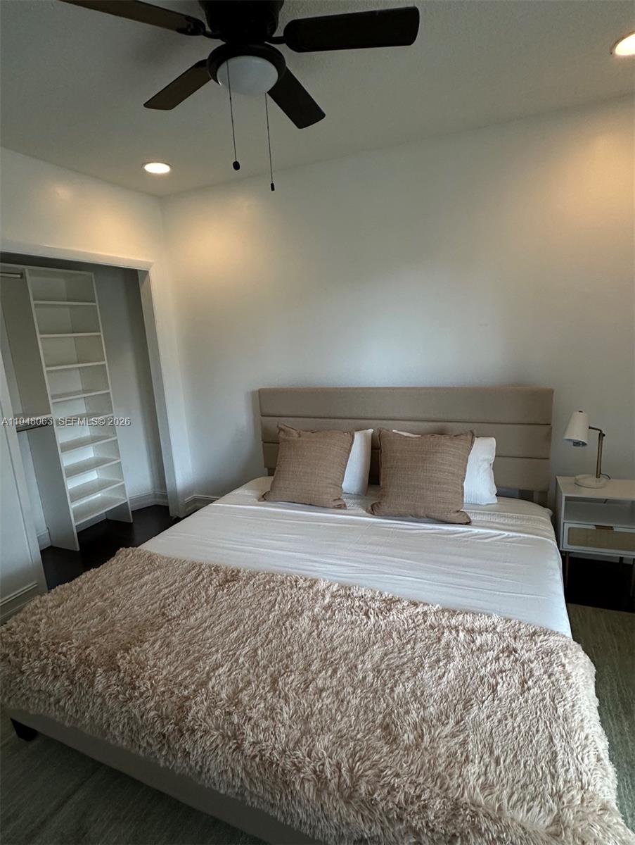 3594 Southwest 69th Avenue Miramar, FL 33023 - Photo 10 of 20 a bedroom with a bed and a ceiling fan