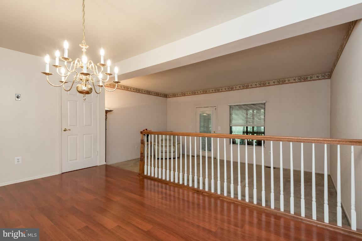 1250 Birchcrest Court Arnold, MD 21012 - Photo 2 of 36 Dining room , family room beyond railing