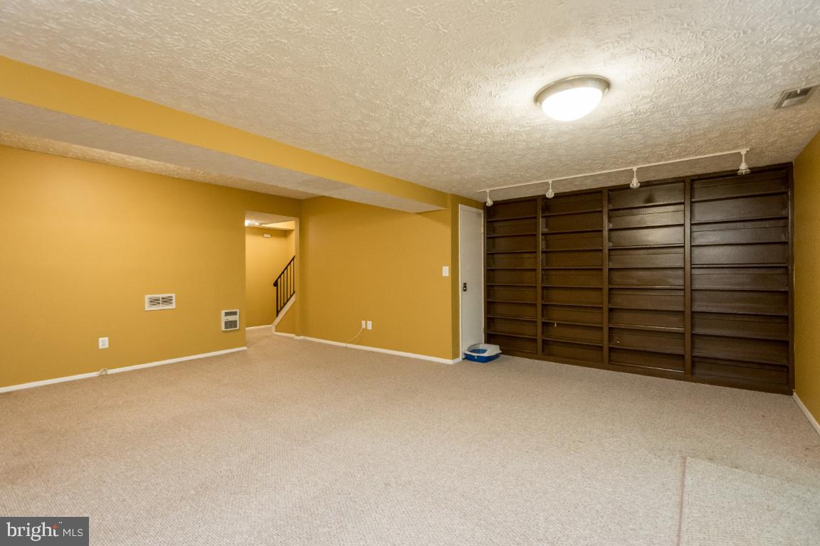 1250 Birchcrest Court Arnold, MD 21012 - Photo 30 of 36 book shelves/ pictures/ video tapes, you name it