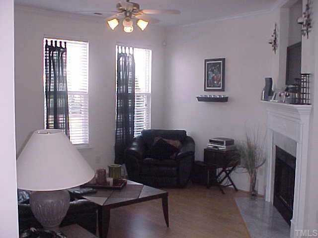 8443 Reedy Ridge Lane Raleigh, NC 27613 - Photo 2 of 10 Main floor Living Room with Corner Fireplace. Other