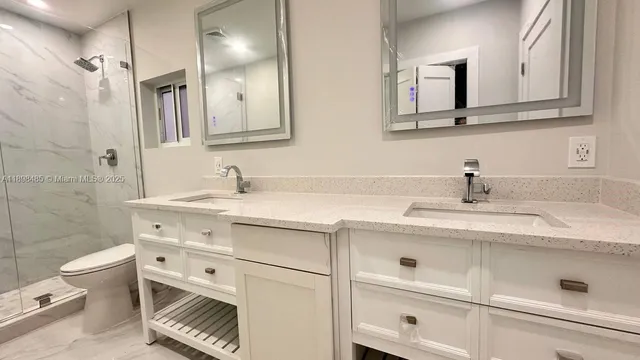 a bathroom with a sink and a toilet