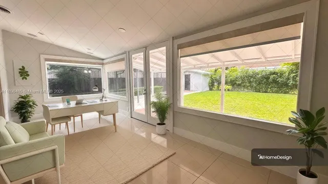a living room with a large window and a table