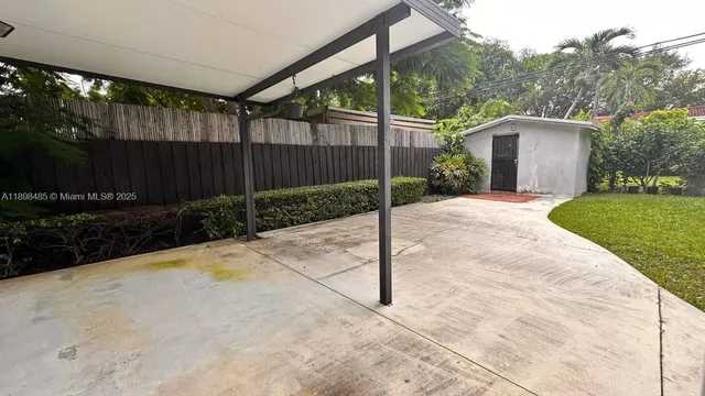 a backyard of a house with lots of green space