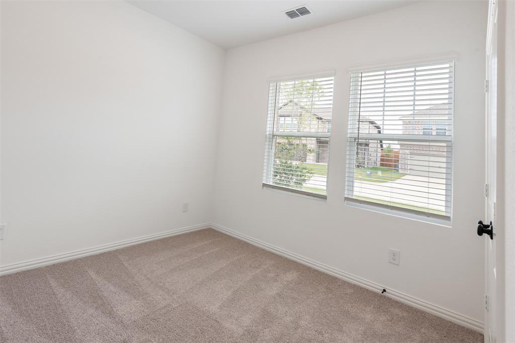 2011 Redtail Drive Melissa, TX 75454 - Photo 13 of 27 an empty room with a window