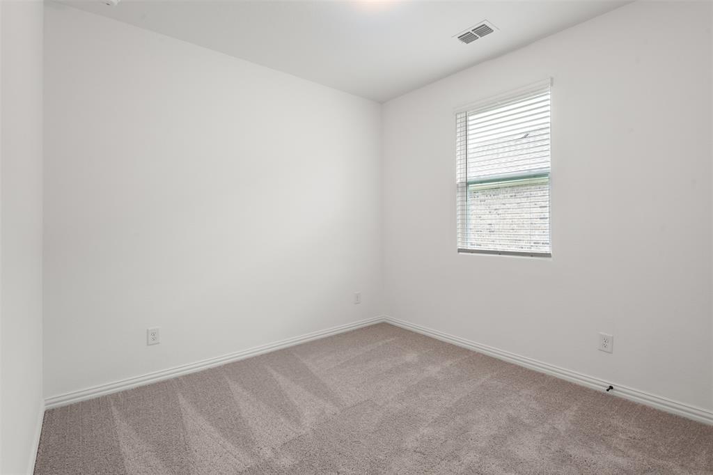2011 Redtail Drive Melissa, TX 75454 - Photo 17 of 27 an empty room with a window