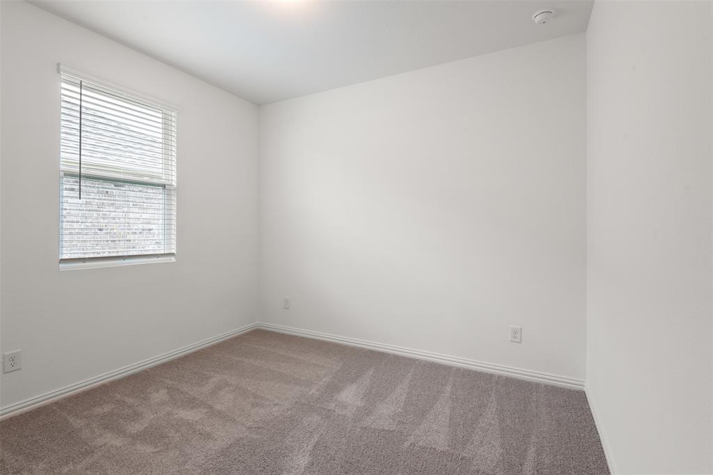 2011 Redtail Drive Melissa, TX 75454 - Photo 19 of 27 an empty room with a window
