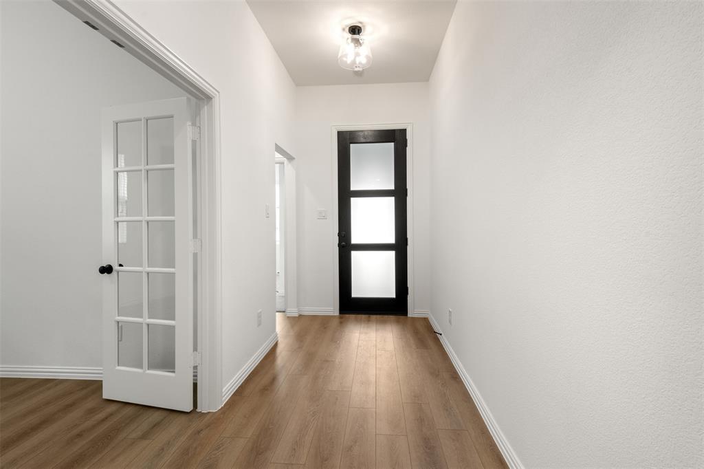 2011 Redtail Drive Melissa, TX 75454 - Photo 2 of 27 a view of wooden floor and windows in a room