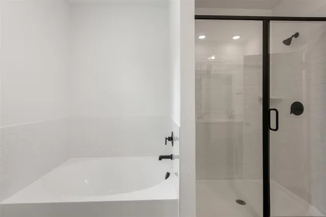 a close up of a bathtub in a bathroom