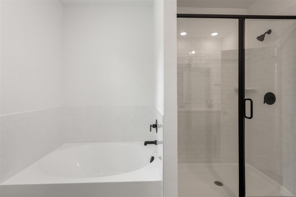 2011 Redtail Drive Melissa, TX 75454 - Photo 22 of 27 a close up of a bathtub in a bathroom