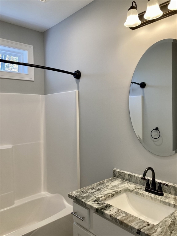 28 Spring Street Petersham, MA 01366 - Photo 19 of 31 a bathroom with a granite countertop sink and a mirror
