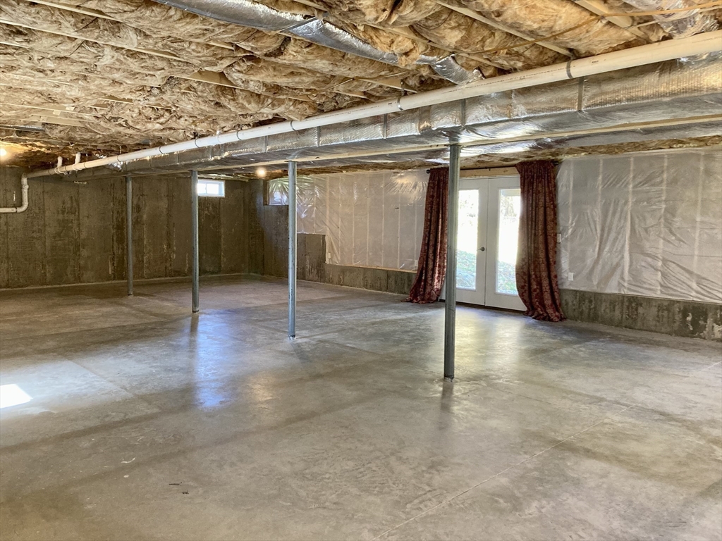 28 Spring Street Petersham, MA 01366 - Photo 25 of 31 a view of an empty room with wooden floor
