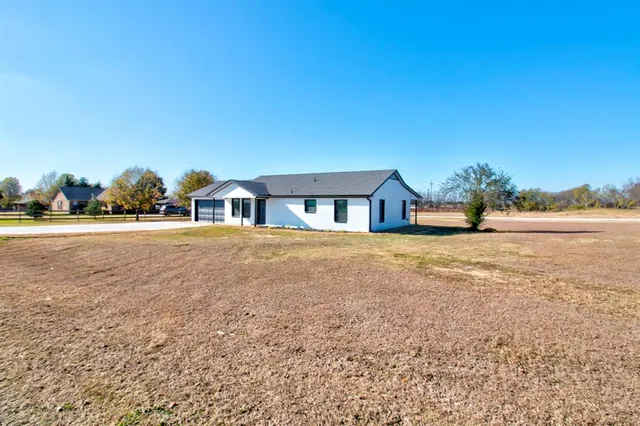 a house view with garden space