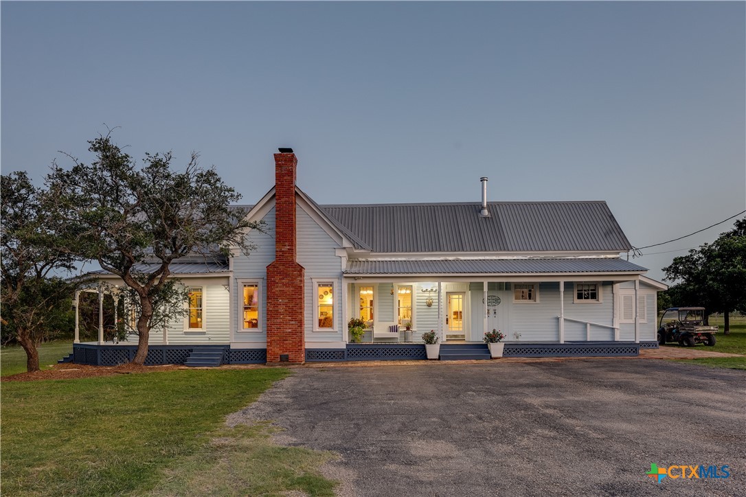 13471 Cedar Valley Road Salado, TX 76571 - Photo 1 of 39 a view of a house with a yard and garage
