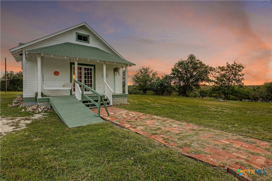 13471 Cedar Valley Road Salado, TX 76571 - Photo 24 of 39 a view of a house with a yard