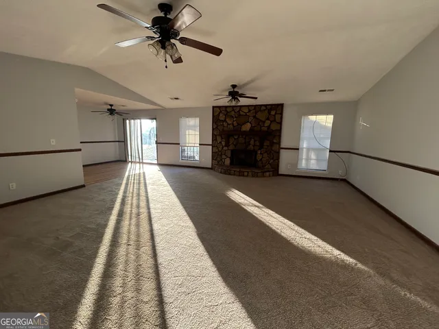 a view of a livingroom with a fireplace