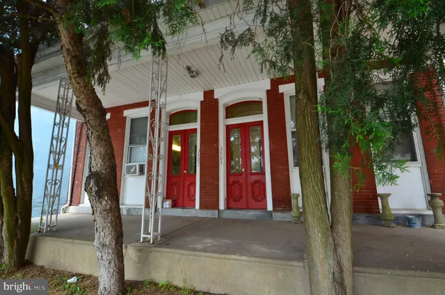 a view of a building with a tree