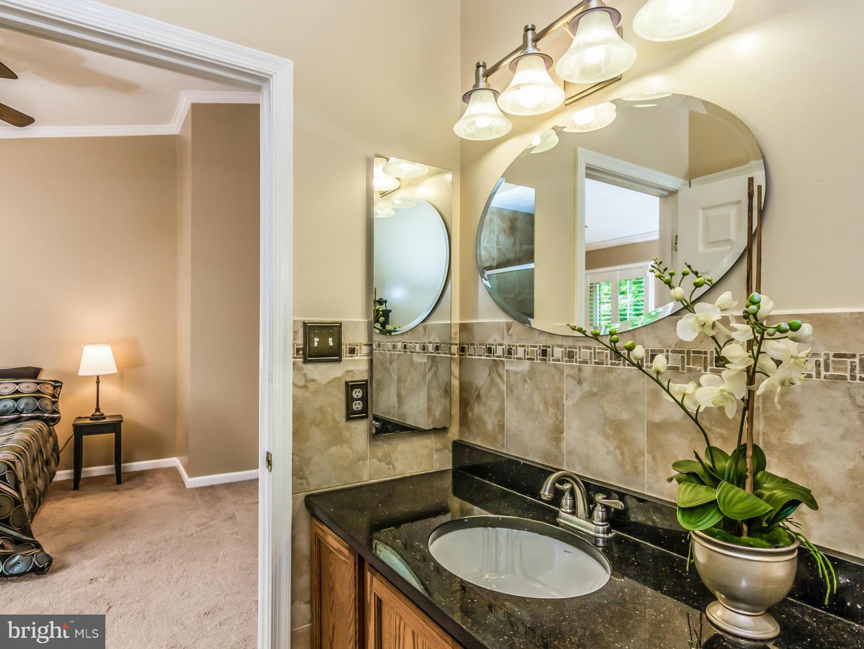 8616 Fire Rock Road Laurel, MD 20724 - Photo 12 of 30 Stunning: granite, tile, accessories.