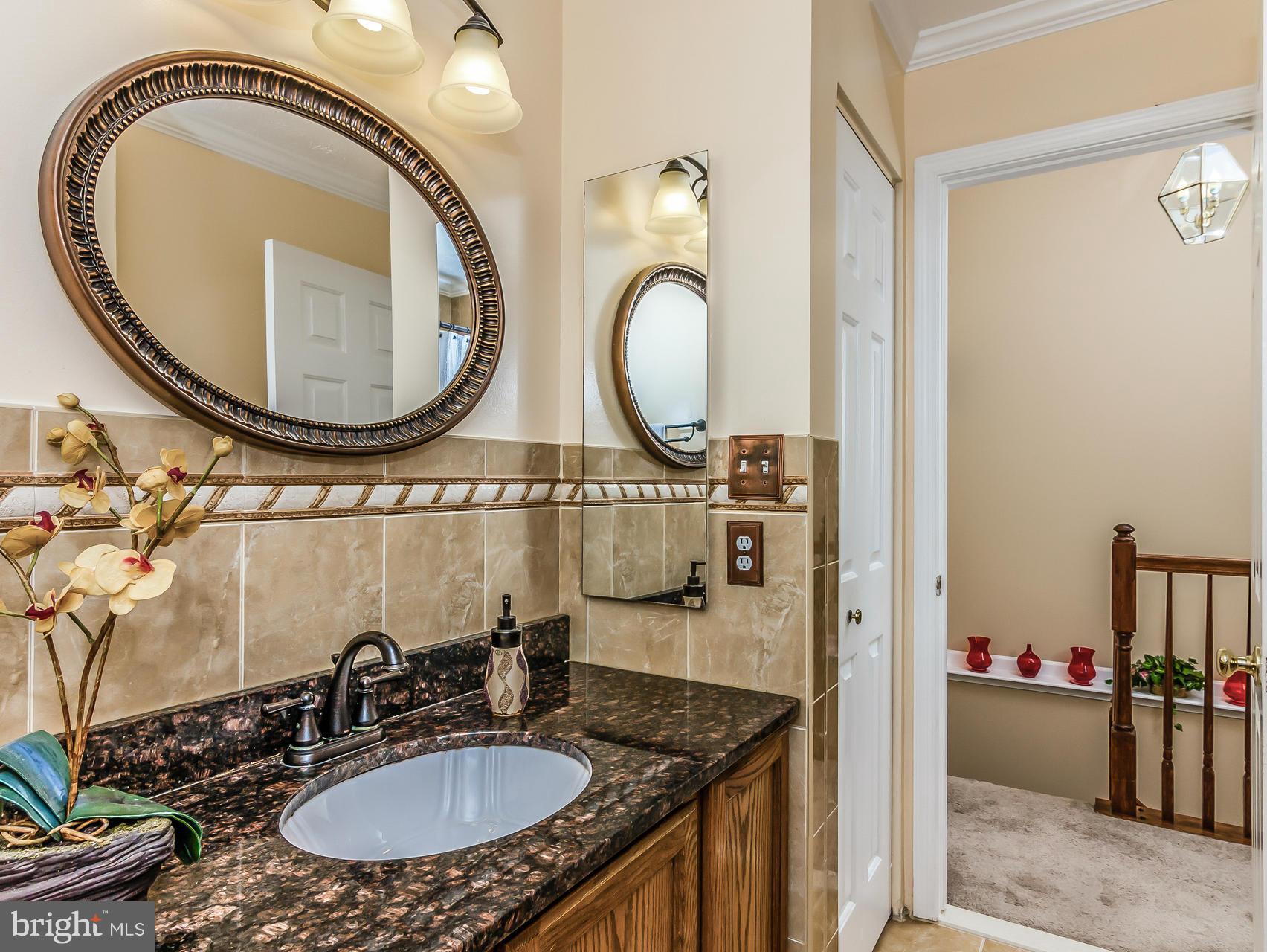 8616 Fire Rock Road Laurel, MD 20724 - Photo 15 of 30 Full bath with tub and beautiful appointments.