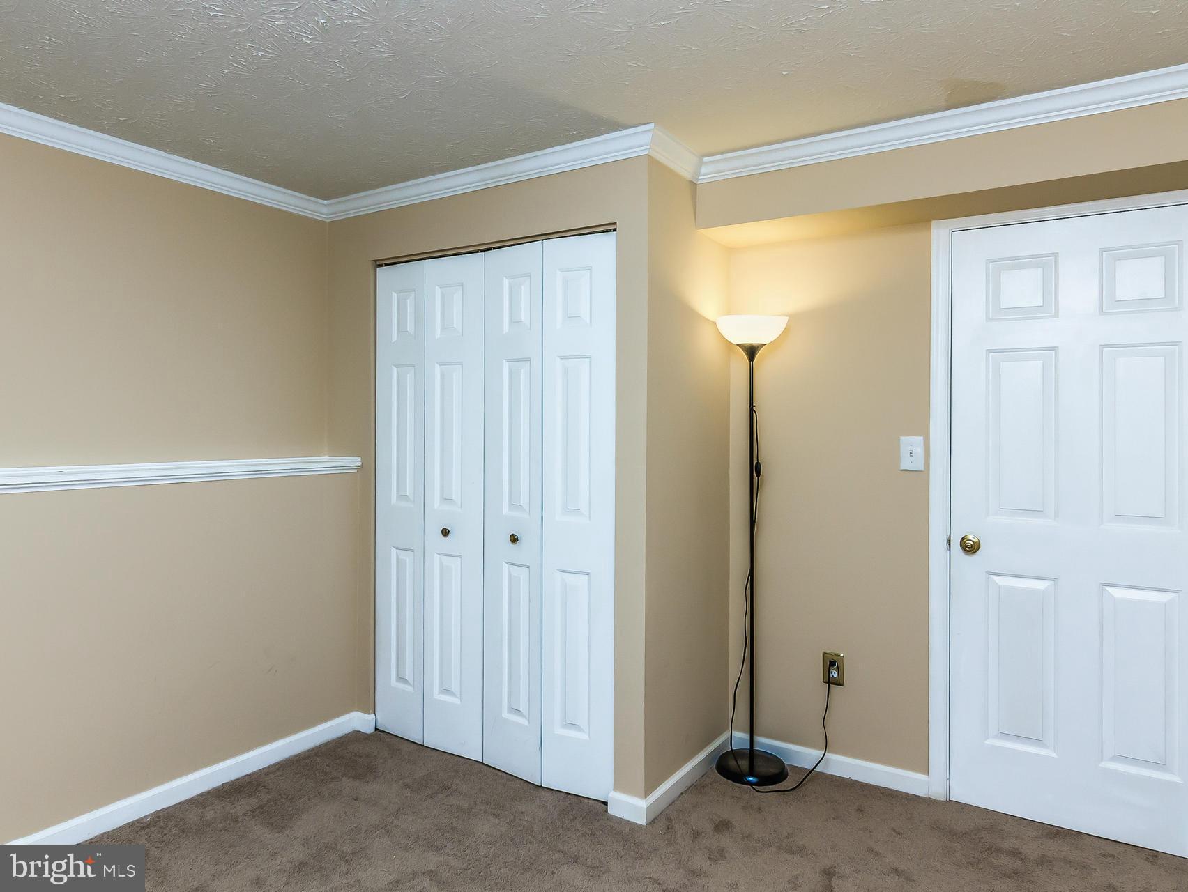 8616 Fire Rock Road Laurel, MD 20724 - Photo 18 of 30 Closet and privacy in guest bedroom.