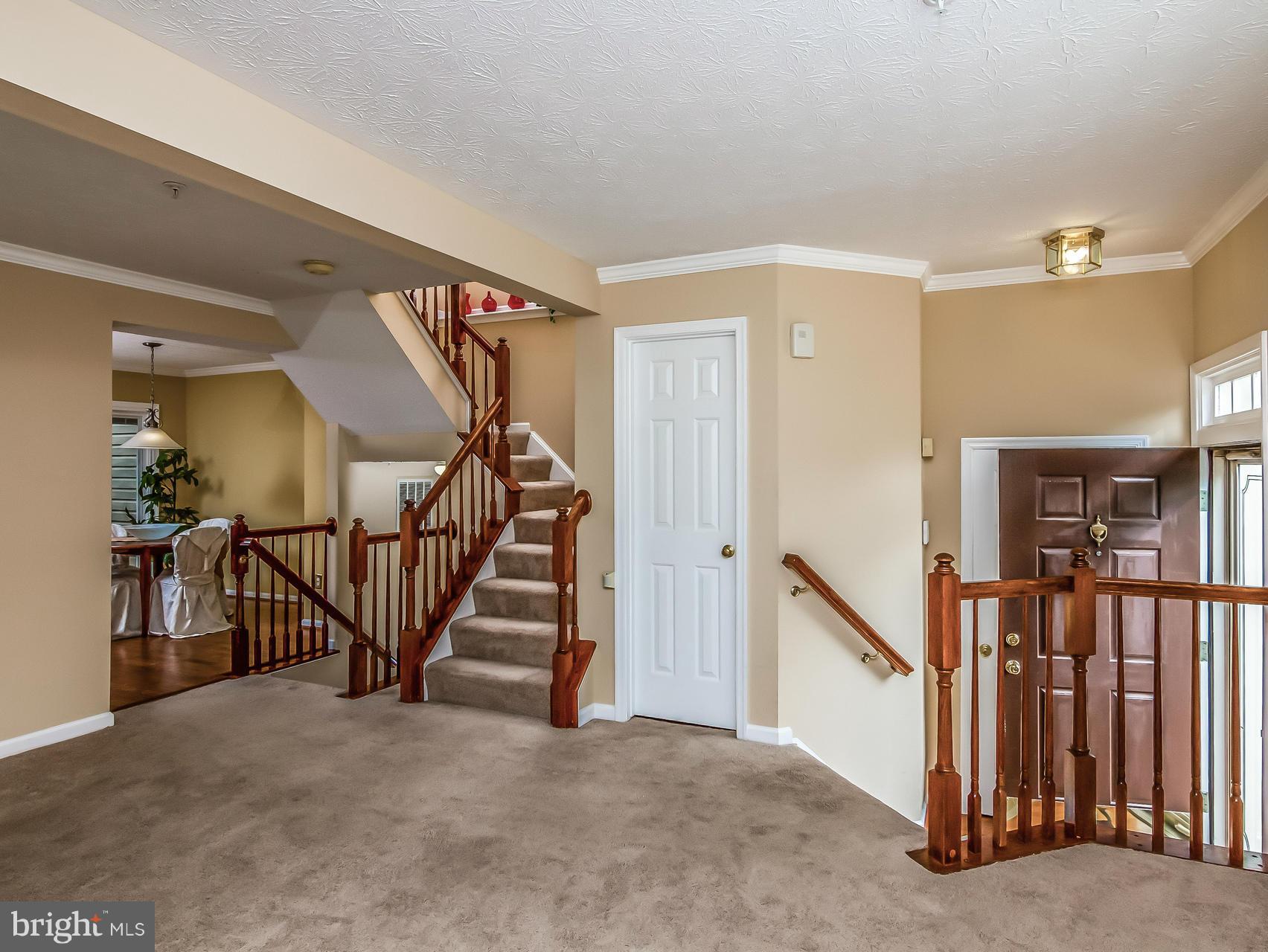8616 Fire Rock Road Laurel, MD 20724 - Photo 6 of 30 Go up stairs, down stairs, into the kitchen.