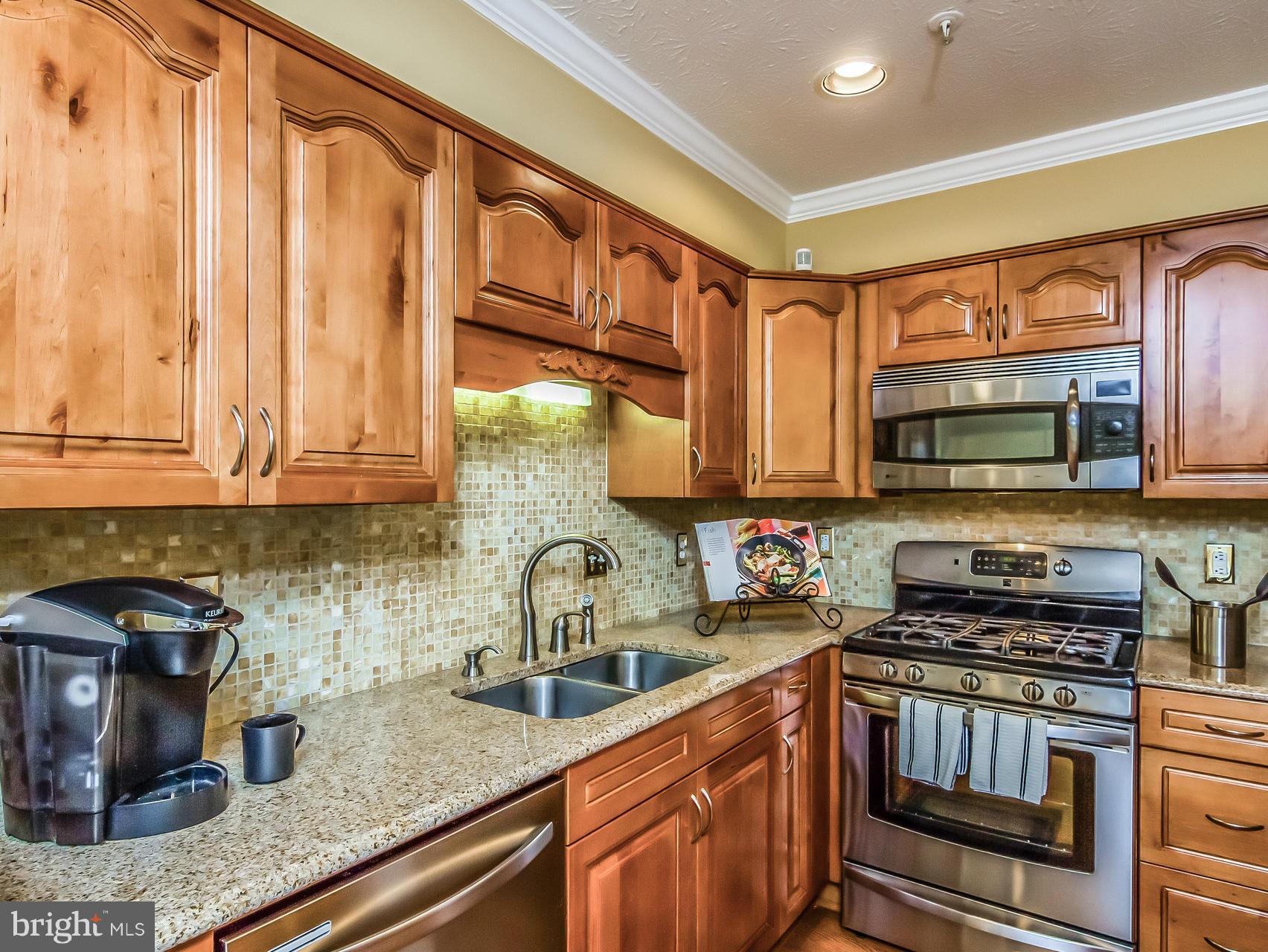 8616 Fire Rock Road Laurel, MD 20724 - Photo 8 of 30 Stunning: maple cabinets and granite counters.
