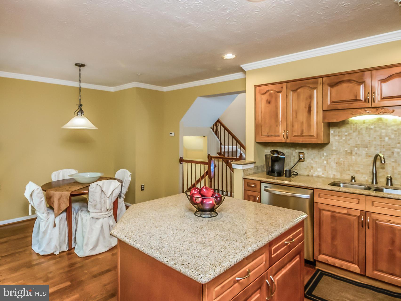 8616 Fire Rock Road Laurel, MD 20724 - Photo 9 of 30 Dine casual at breakfast bar or sit at the table.