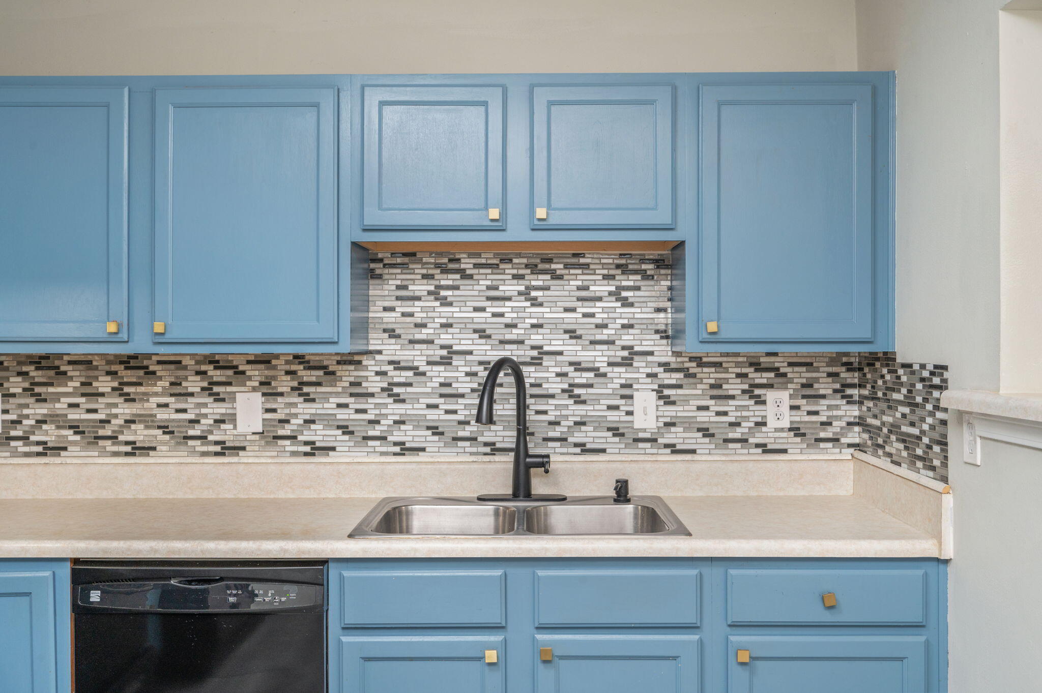 242 Wainwright Drive Crestview, FL 32539 - Photo 15 of 43 a kitchen with a sink and cabinets