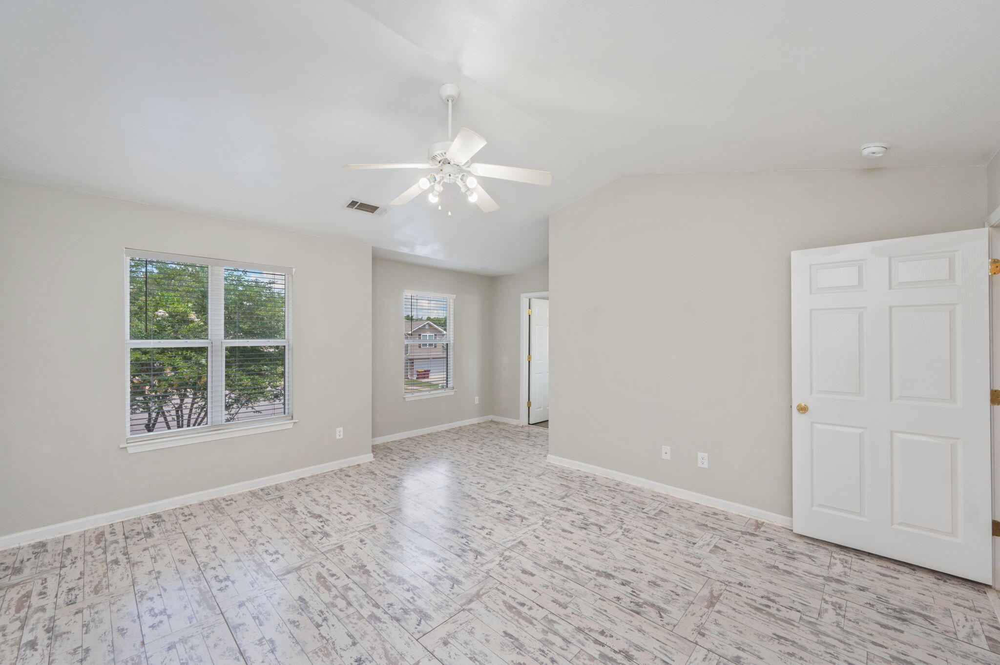 242 Wainwright Drive Crestview, FL 32539 - Photo 22 of 43 a view of an empty room with a window
