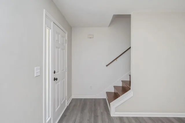 a view of entryway with stairs